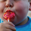 fat child with lolly